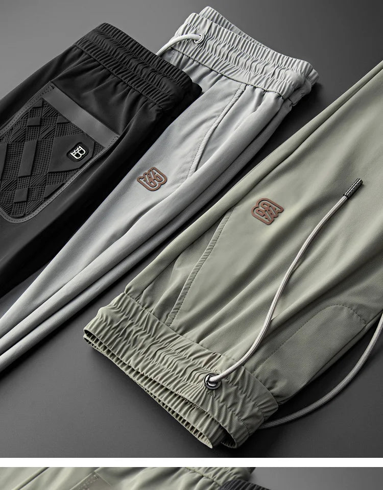 High end brand men's fashionable embroidered casual pants 2024 summer new cool silk breathable luxury solid color sports pants