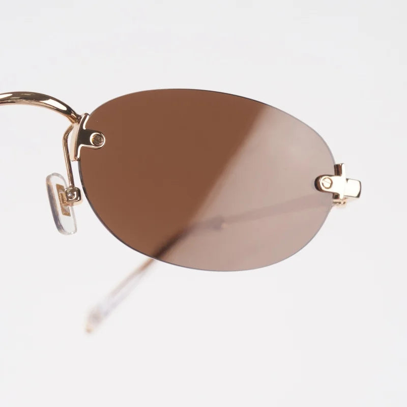 New frameless oval women's small glasses sunglasses brand designer fashionable luxury girls travel driving party sunglasses