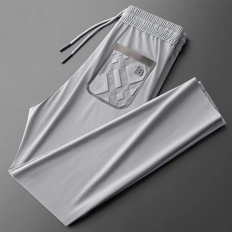 High end brand men's fashionable embroidered casual pants 2024 summer new cool silk breathable luxury solid color sports pants