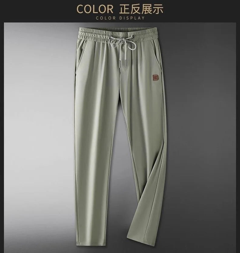 High end brand men's fashionable embroidered casual pants 2024 summer new cool silk breathable luxury solid color sports pants