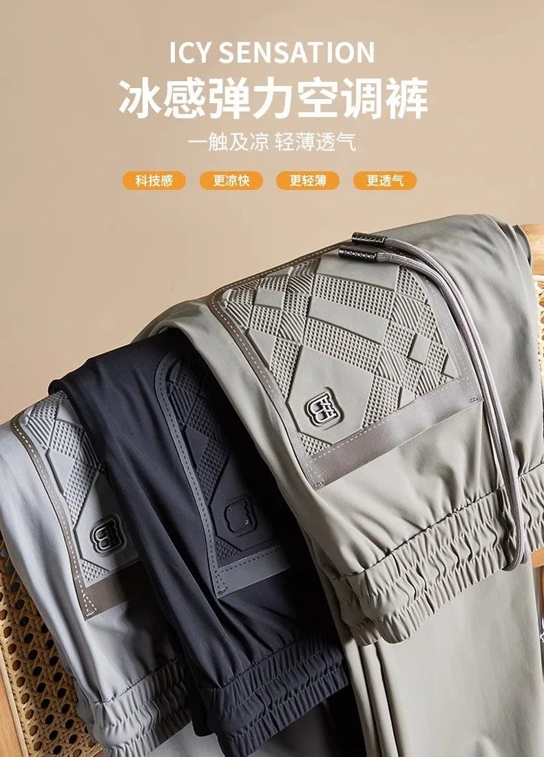High end brand men's fashionable embroidered casual pants 2024 summer new cool silk breathable luxury solid color sports pants