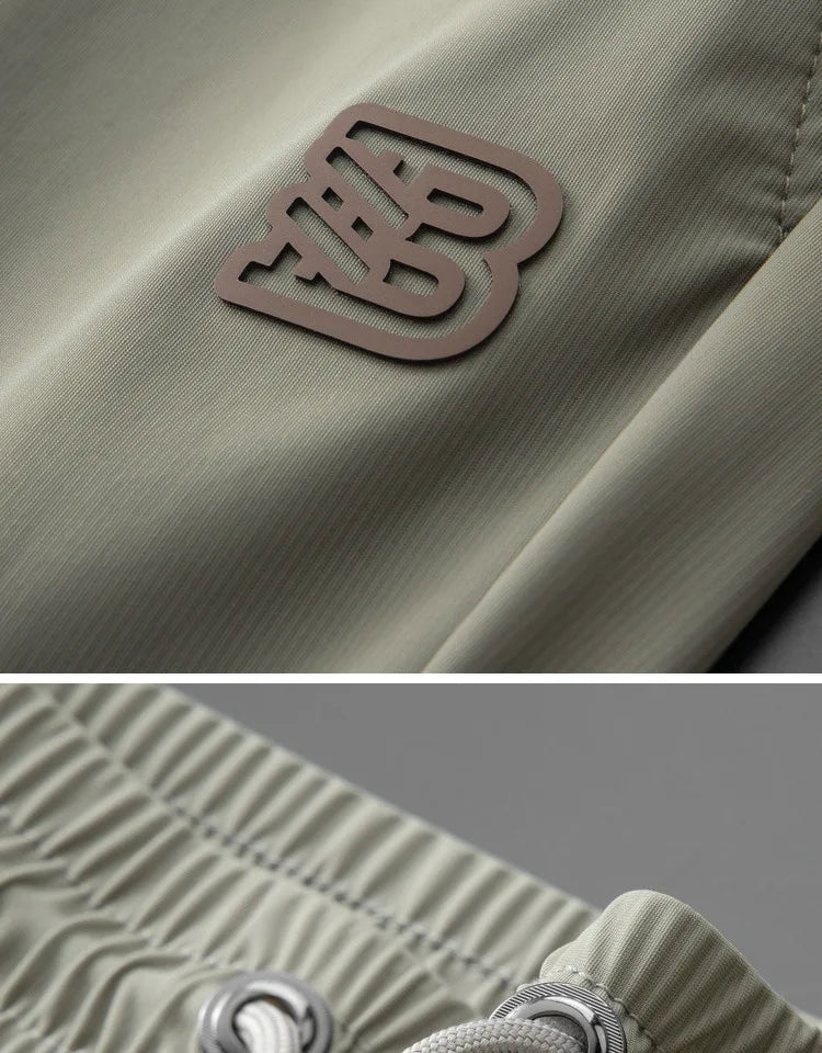 High end brand men's fashionable embroidered casual pants 2024 summer new cool silk breathable luxury solid color sports pants